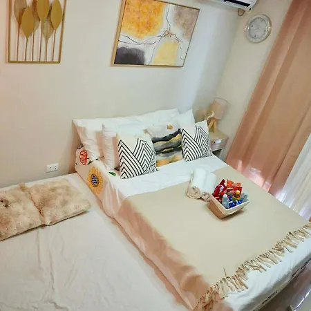 Gold-Themed Condo With Balcony And Free Pool Access